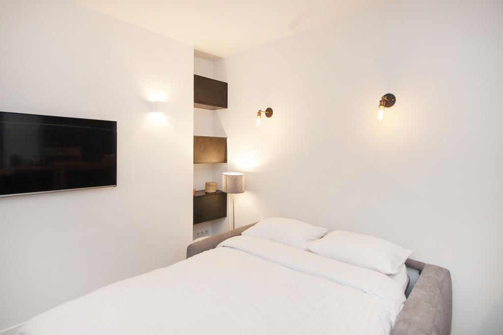 פריז Pick A Flat'S Apartment In Le Marais - Rue Sainte Croix De La Bretonnerie מראה חיצוני תמונה